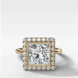 Bezel Set Halo Engagement Ring With Princess Cut Diamond