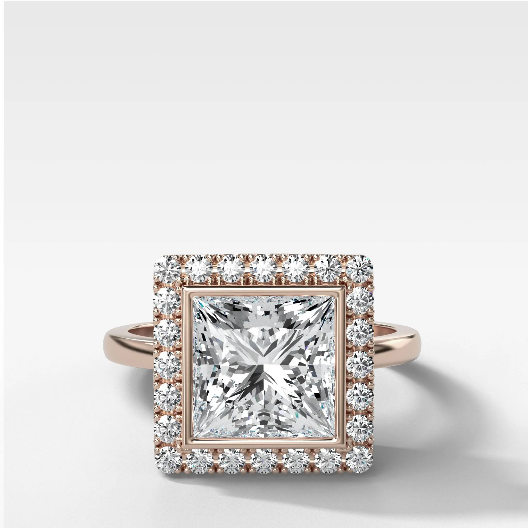 Bezel Set Halo Engagement Ring With Princess Cut Diamond