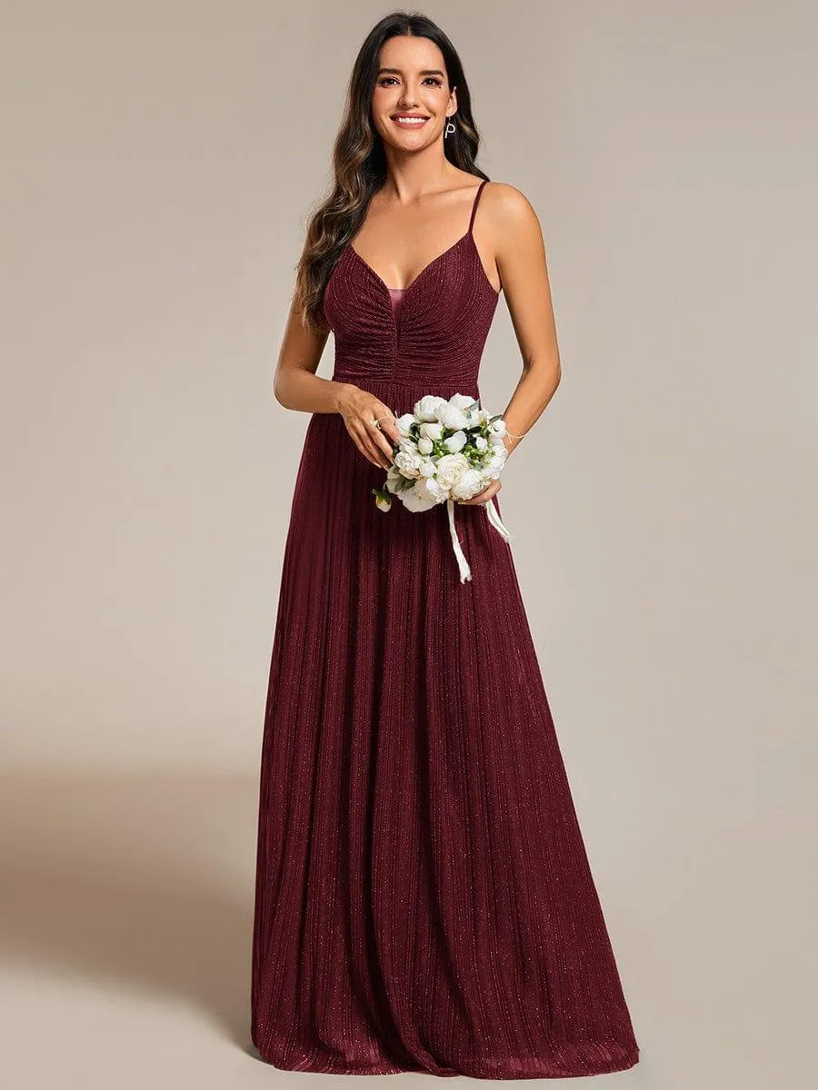 Robe de soirée plissée scintillante à bretelles spaghetti et taille empire
