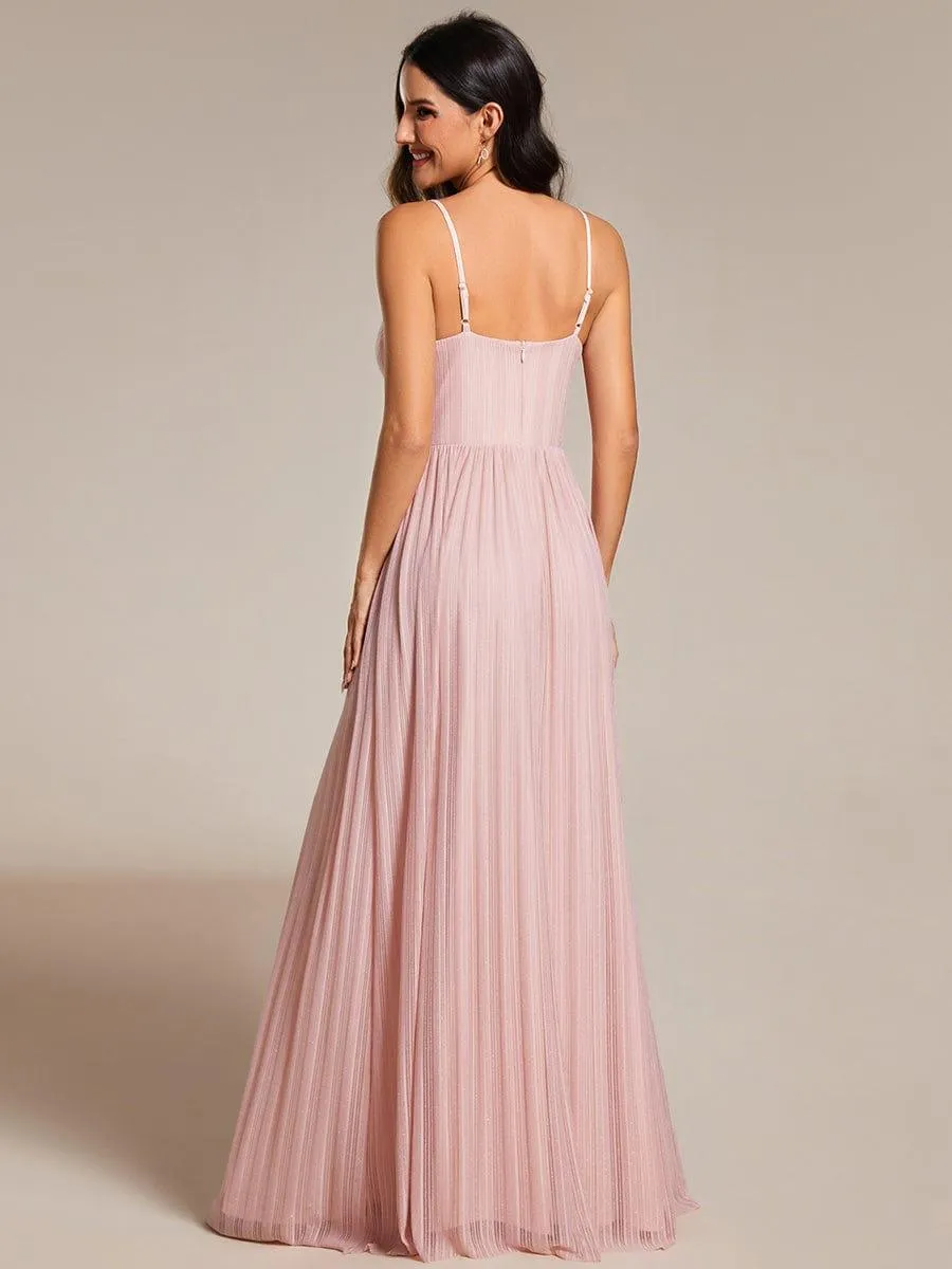 Robe de soirée plissée scintillante à bretelles spaghetti et taille empire