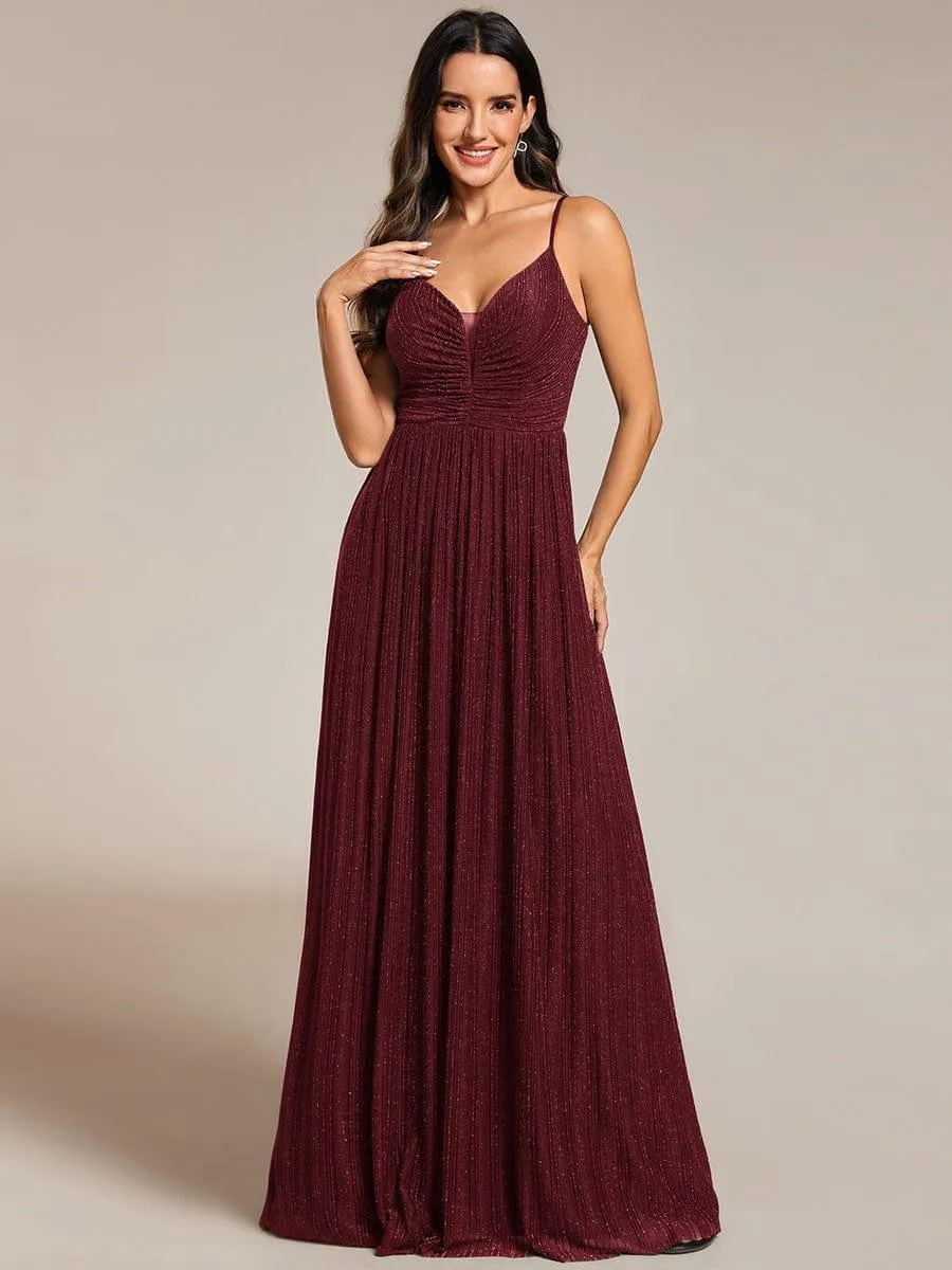 Robe de soirée plissée scintillante à bretelles spaghetti et taille empire