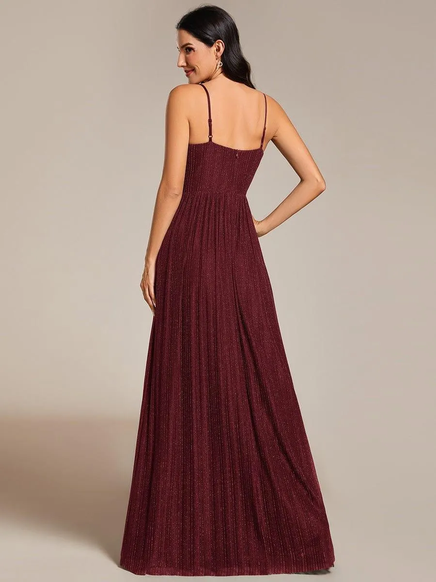 Robe de soirée plissée scintillante à bretelles spaghetti et taille empire