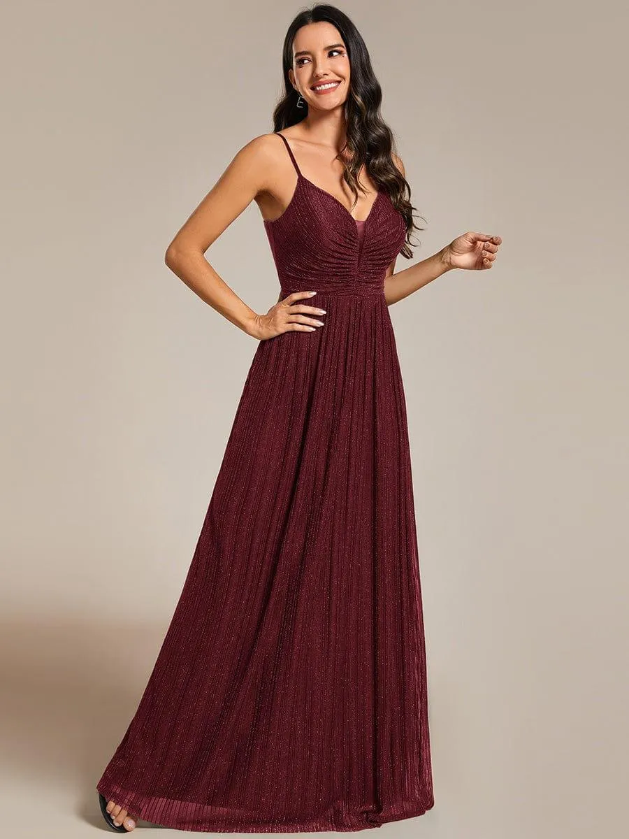 Robe de soirée plissée scintillante à bretelles spaghetti et taille empire