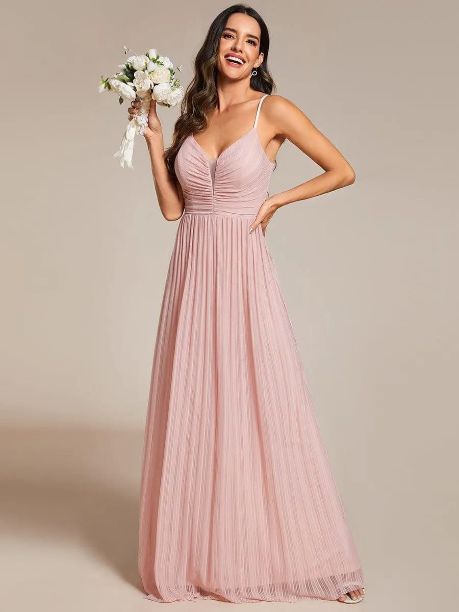 Robe de soirée plissée scintillante à bretelles spaghetti et taille empire