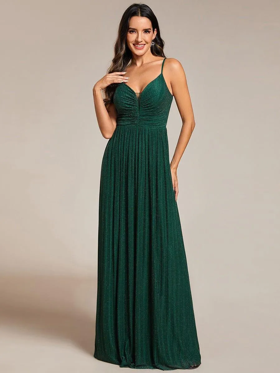 Robe de soirée plissée scintillante à bretelles spaghetti et taille empire