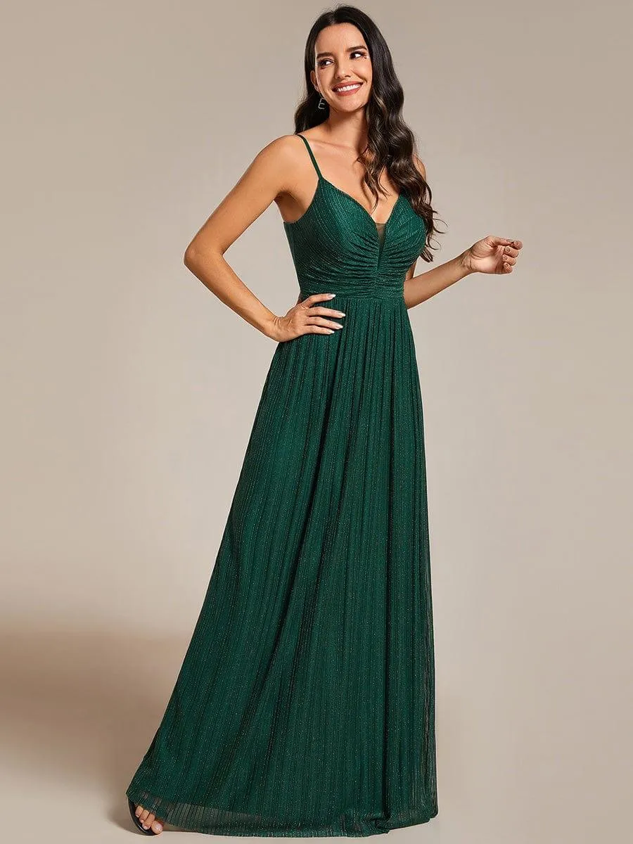 Robe de soirée plissée scintillante à bretelles spaghetti et taille empire