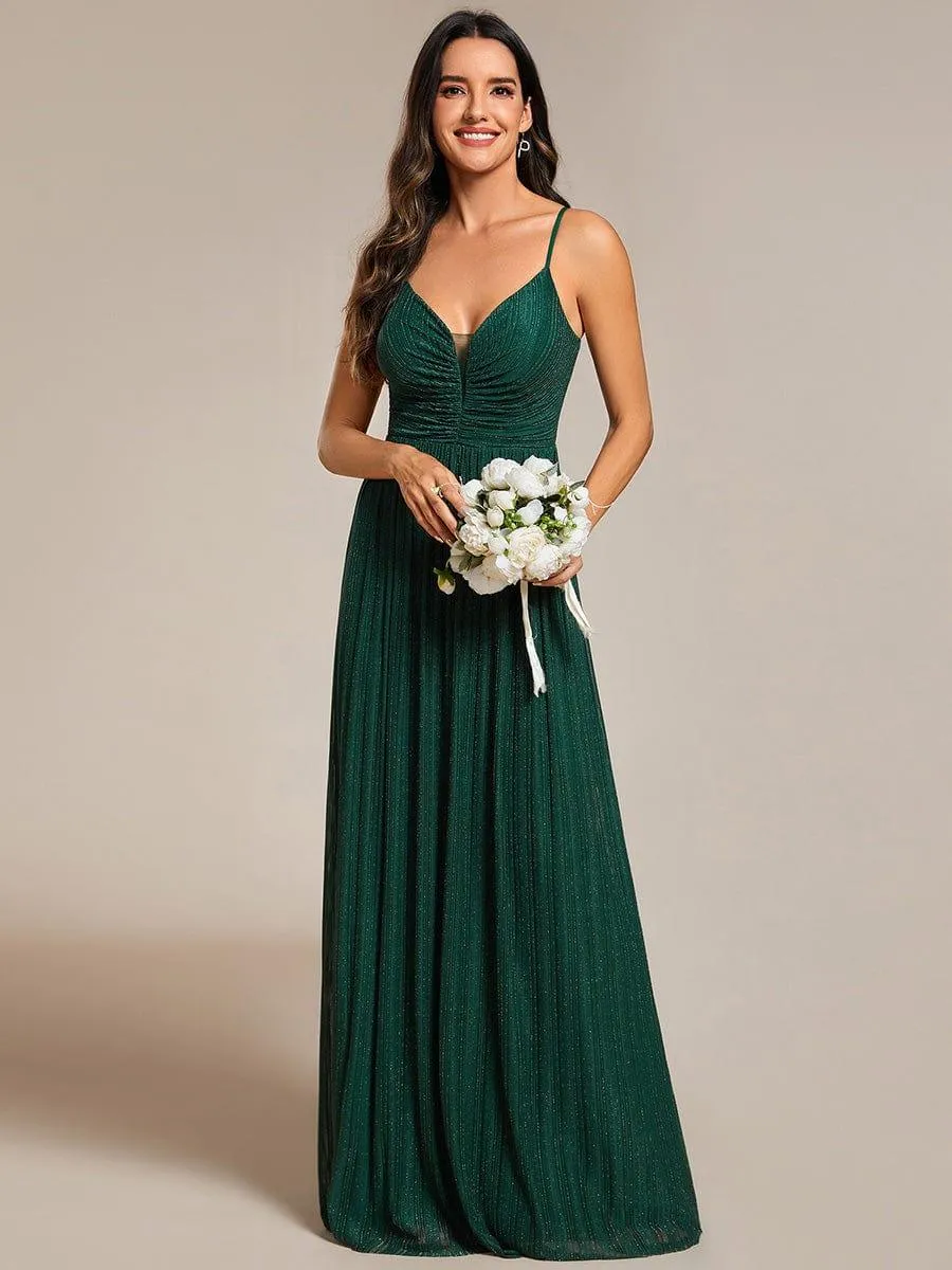 Robe de soirée plissée scintillante à bretelles spaghetti et taille empire